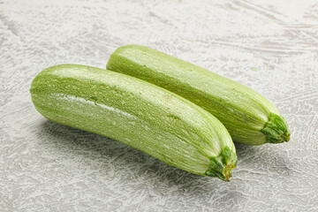 Raw green ripe zucchini vegetable