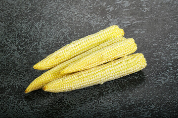 Raw sweet baby corn heap