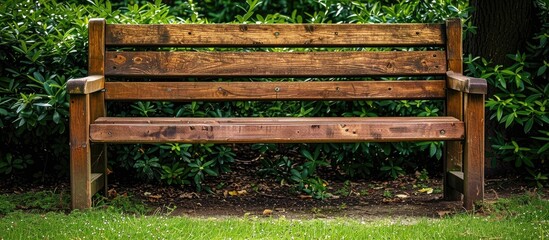 Naklejka premium A Vintage Timber Garden Bench In A Park