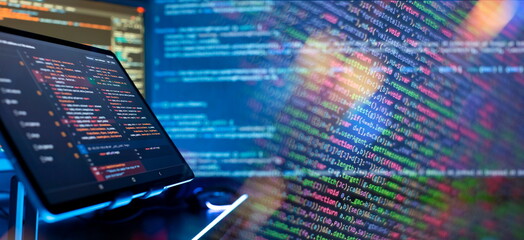 Programming code abstract screen of software developer. Coding script text on screen.