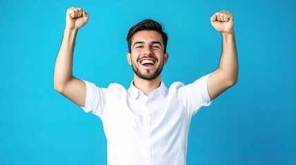 Fototapeta premium Happy Man Celebrating Against Blue Background