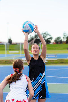 Two aboriginal sisters at the court training for netball team
