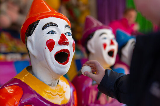 Clowns at side show alley at the local agricultural show - Powered by Adobe
