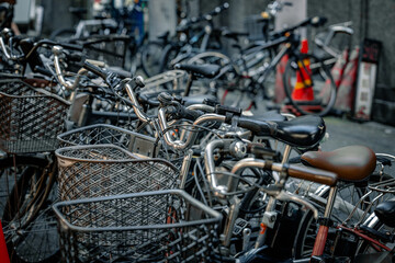 Fototapeta premium Parked city bicycles in Osaka Japan. Green transportation concept.