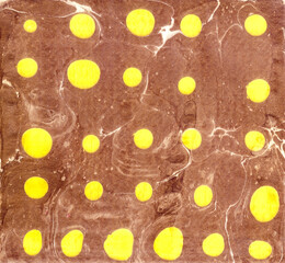 Yellow dots on a brown abstract background. Abstract background.