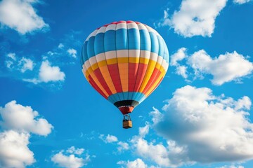 Obraz premium photo of a hot air with colorful strip balloon in blue sky