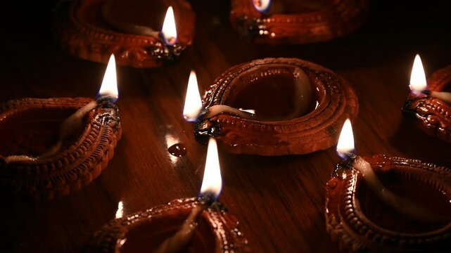Happy Diwali - Beautiful diwali diya lamps lit during diwali celebration. Indian festival diwali
