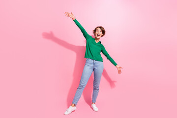 Full length photo of crazy positive lady wear green stylish clothing open hands glad to see you welcome isolated on pink color background