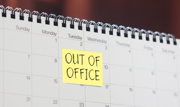 Out of office - memo on office calendar. Holiday Announcement, Day Off