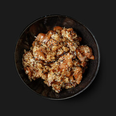 Traditional Asian dish seafood salad, rice, wok, top view, dark background