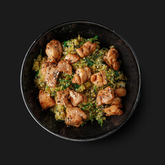 Traditional Asian dish seafood salad, rice, wok, top view, dark background