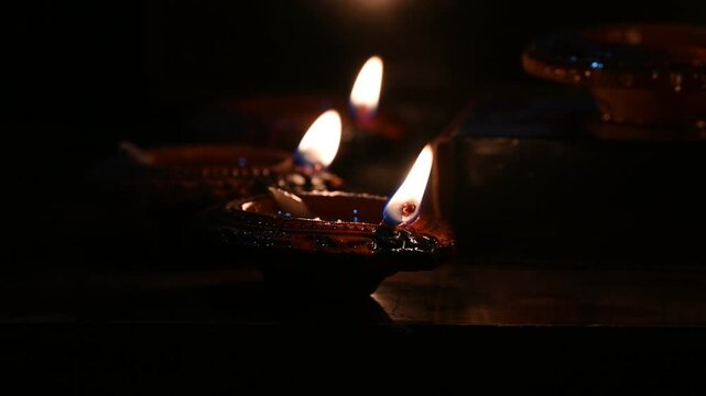 Happy Diwali - Beautiful diwali diya lamps lit during diwali celebration. Indian festival diwali