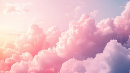 Fototapeta premium Soft Pink Clouds Under Bright Sky at Sunset