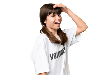 Little volunteer girl over isolated background doing surprise gesture while looking to the side