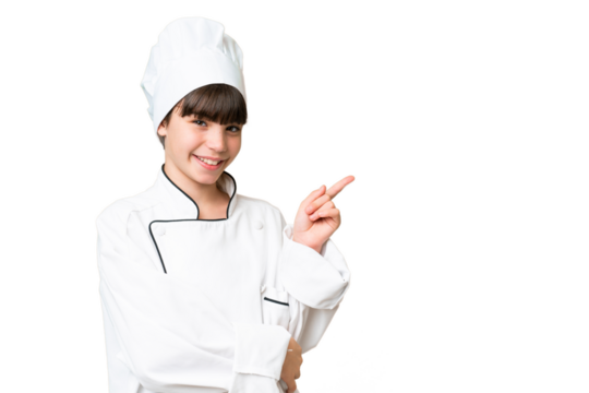 Little caucasian chef girl over isolated background pointing finger to the side
