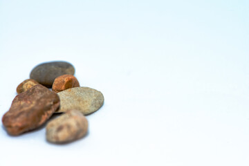 Macro Photo of Pebble Stones on White Background