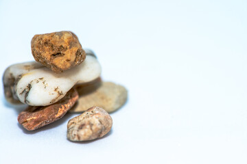 Macro Photo of Pebble Stones on White Background