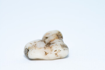Macro Photo of Pebble Stones on White Background