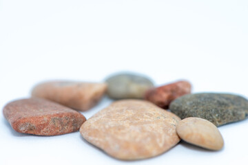 Macro Photo of Pebble Stones on White Background