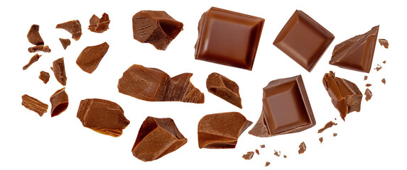 Chocolate explosion isolated on white. Flying milk Chocolate pieces Top view. Flat lay. Chocolate...