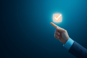 A businessman’s hand reaching out, holding a glowing virtual checkmark icon in the air, against a sleek blue background, symbolizing high-quality service. 