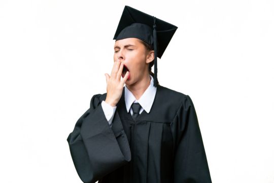 Young university graduate  caucasian woman over isolated background yawning and covering wide open mouth with hand