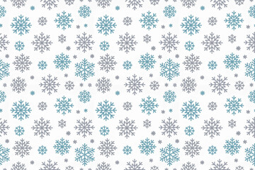青と銀色のキラキラした雪の結晶のシームレスパターン、白背景