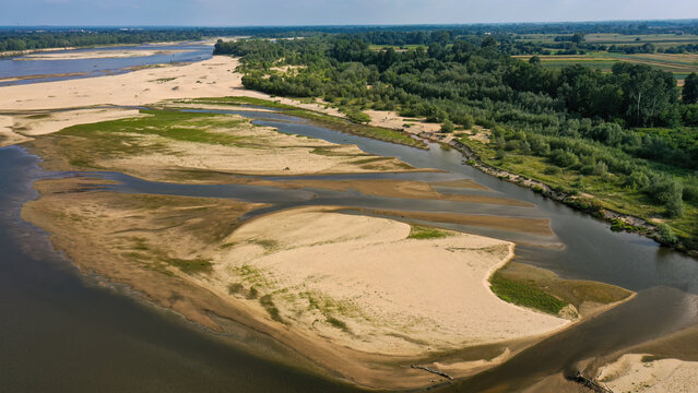 Aerial pictures of huge patches of sand in the Vistula river being a natural and safe habitat for many species of birds. 