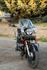 Fototapeta premium A vintage-style motorcycle on the road. motorbike vertical photo