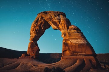 Majestic rock arch against starry night sky - Powered by Adobe