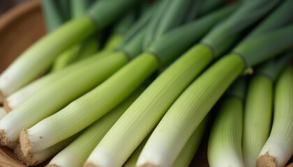 Obraz premium A close-up of fresh green leeks arranged together, showcasing their crisp texture and vibrant green color.