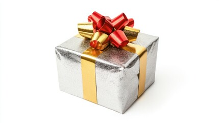 Fototapeta premium Gold and silver-wrapped New Year present with a bold red bow, isolated on a white background, perfect for celebrating the holiday.