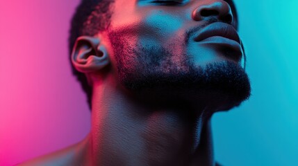 An abstract image of a color-lit neck and jawline, providing a profile view that artistically highlights the human form in striking neon hues evoking mystery and depth.