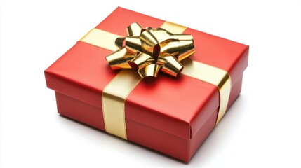 Obraz premium New Year gift box wrapped in glossy red paper with a gold ribbon, isolated on white background, showing festive spirit.