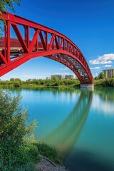 Vibrant red bridge over serene river