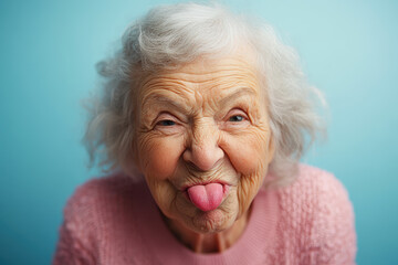Senior Woman Sticking Out Tongue in Playful Pose