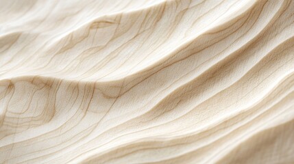 Soft, wavy, light brown wood grain texture.