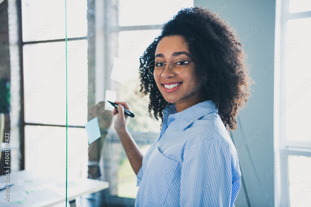 Wall mural Photo of sweet charming lady assistant wear shirt writing notes stickers indoors workplace workstation