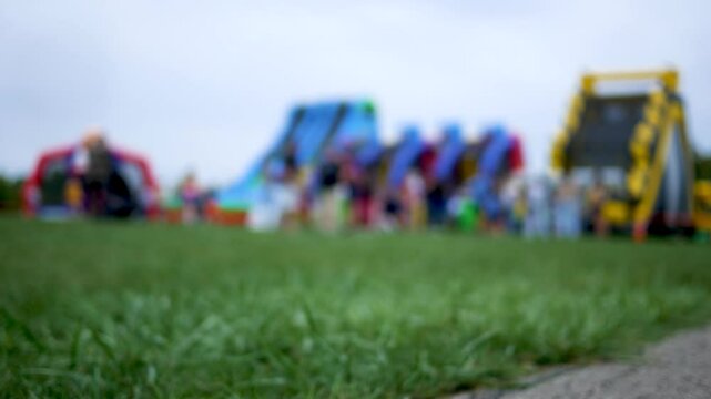 Defocused Bounce Houses at a Carnival or Fair
