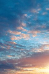 Sunset sky landscape, picturesque view of colorful sunset sky with sunshine and orange clouds, sunset sky background