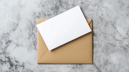 Blank White Card in a Brown Envelope on Marble