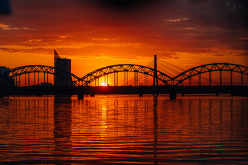 Obraz premium Riga railway bridge at sunset
