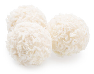 Round white chocolate candies covered with blanched coconut on white background. File contains clipping path.