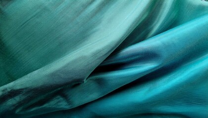 A wide, panoramic web banner features a gradient of green, turquoise, and teal blue, creating an abstract texture background. This colorful matte canvas fabric offers ample space for design