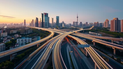 Fototapeta premium A stunning cityscape at dusk, with intertwining highways creating intricate light trails against a background of skyscrapers.