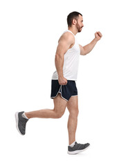 Handsome young man running on white background