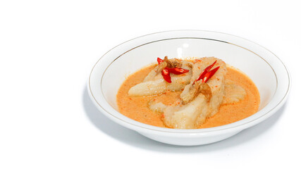 Laksan, a typical food from the city of Palembang (South Sumatra) in Indonesia. Consists of sliced ​​fish cakes served in coconut milk-shrimp sauce, sprinkled with fried shallots.