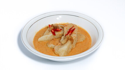 Laksan, a typical food from the city of Palembang (South Sumatra) in Indonesia. Consists of sliced ​​fish cakes served in coconut milk-shrimp sauce, sprinkled with fried shallots.