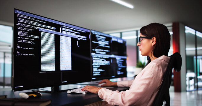 Web Developer Coding On Computer