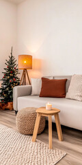 Cozy living room decorated for the holidays with a Christmas tree, candle, and warm lighting creating a festive atmosphere